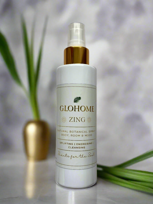 Glohome Zing bottle with a gold cap on a blurred background